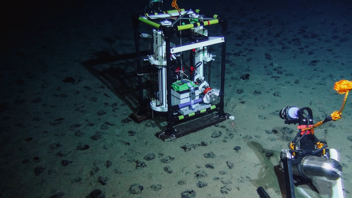 Underwater research equipment surveying seafloor sediment during deep-sea mining impact study