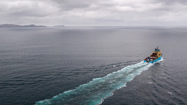 Deep-sea mining research vessel sailing across open ocean waters